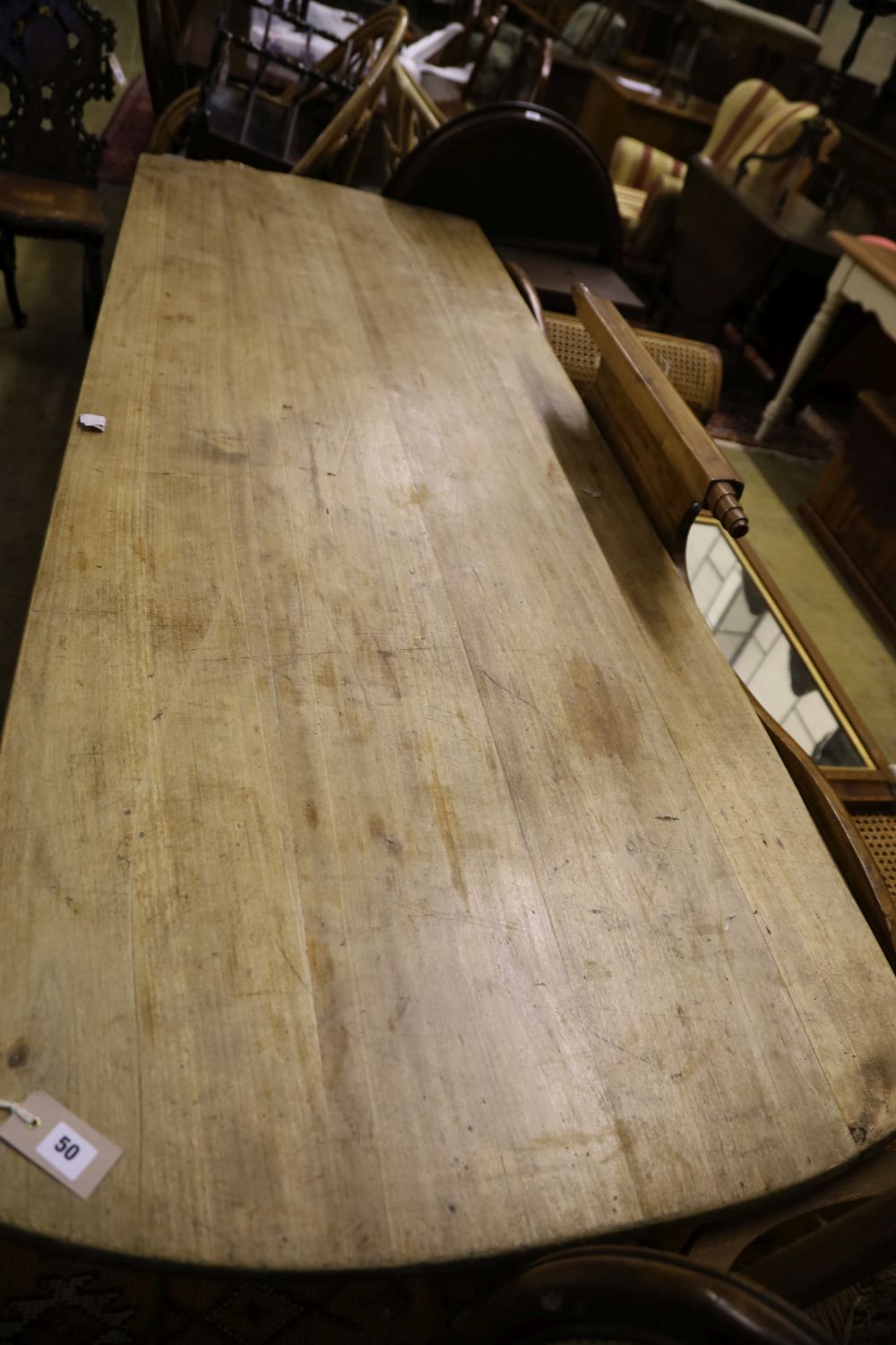 A 19th century Continental mahogany and fruitwood kitchen table, width 220cm, depth 80cm, height 75cm